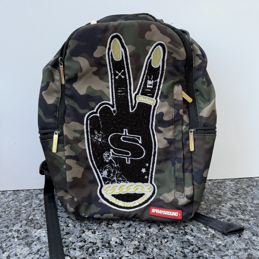 Sprayground Camouflage Backpack with Peace Sign Patch